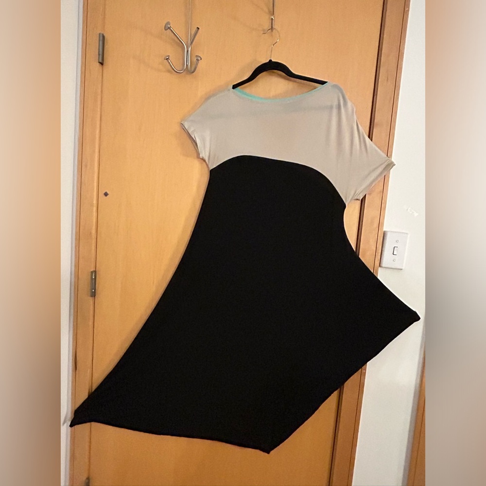 Marie St Pierre midi dress. GUC Asymmetrical sleeves , narrow at knee.